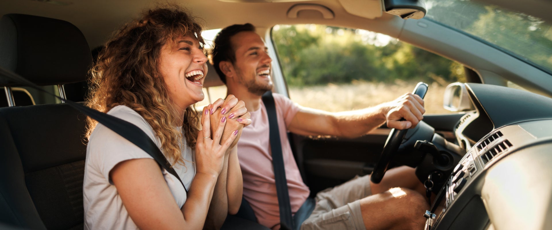 First Time Buyers driving in their new vehicle